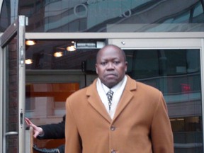 Dr. John Kitakufe, seen here leaving his disciplinary hearing at the Ontario College of Physicians and Surgeons in 2012, now seeks to have his medical licence reinstated.