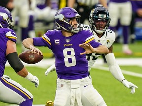 Minnesota Vikings quarterback Kirk Cousins (8) throws against the Jacksonville Jaguars at U.S. Bank Stadium.