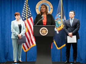 New York State Attorney General, Letitia James, speaks next to independent investigators Anne L. Clark and Joon H. Kim  during a news conference regarding a probe that found New York Governor Andrew Cuomo sexually harassed multiple women, in New York City, Tuesday, Aug. 3, 2021.