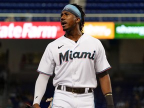 Lewis Brinson of the Miami Marlins shouts to the crowd after hitting a double for two RBIs in the eighth inning against the New York Mets at loan Depot park on Aug. 5, 2021 in Miami, Fla.