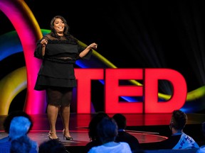 This handout photo courtesy of TED Conferences LLC shows singer Lizzo speaking at TEDMonterey on August 3, 2021 in Monterey, California.