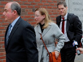 Marci Palatella (centre), the CEO of a liquor distribution company facing charges in a nationwide college admissions cheating scheme.