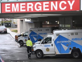 Ambulances sit at the emergency room entrance at the Michael Garron Hospital in Toronto on Thursday, April 29, 2021.