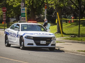 Peel Regional Police at the scene of a shooting at Darcel Ave. and Woodruff Cres. in Mississauga, on Monday, August 2, 2021.