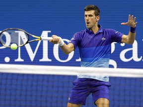 Novak Djokovic of Serbia hits a forehand against Holger Vitus Nodskov Rune of Denmark (not pictured) at the U.S. Open at USTA Billie King National Tennis Center in Flushing, N.Y., Aug. 31, 2021.