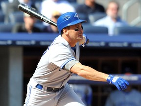 Omar Vizquel of the Blue Jays connects on a single against the New York Yankees at Yankee Stadium on September 19, 2012.