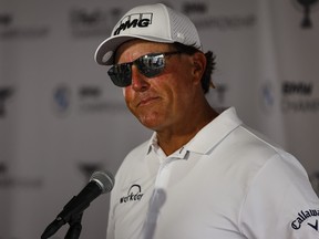 Phil Mickelson speaks to the media finishing play in the first round of the BMW Championship golf tournament in Owings Mills, Md., Aug. 26, 2021.
