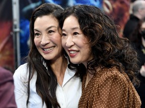 Michelle Yeoh and Sandra Oh attend the "Shang-Chi and the Legend of the Ten Rings" U.K. gala screening at Curzon Cinema Mayfair on Aug. 26, 2021 in London.