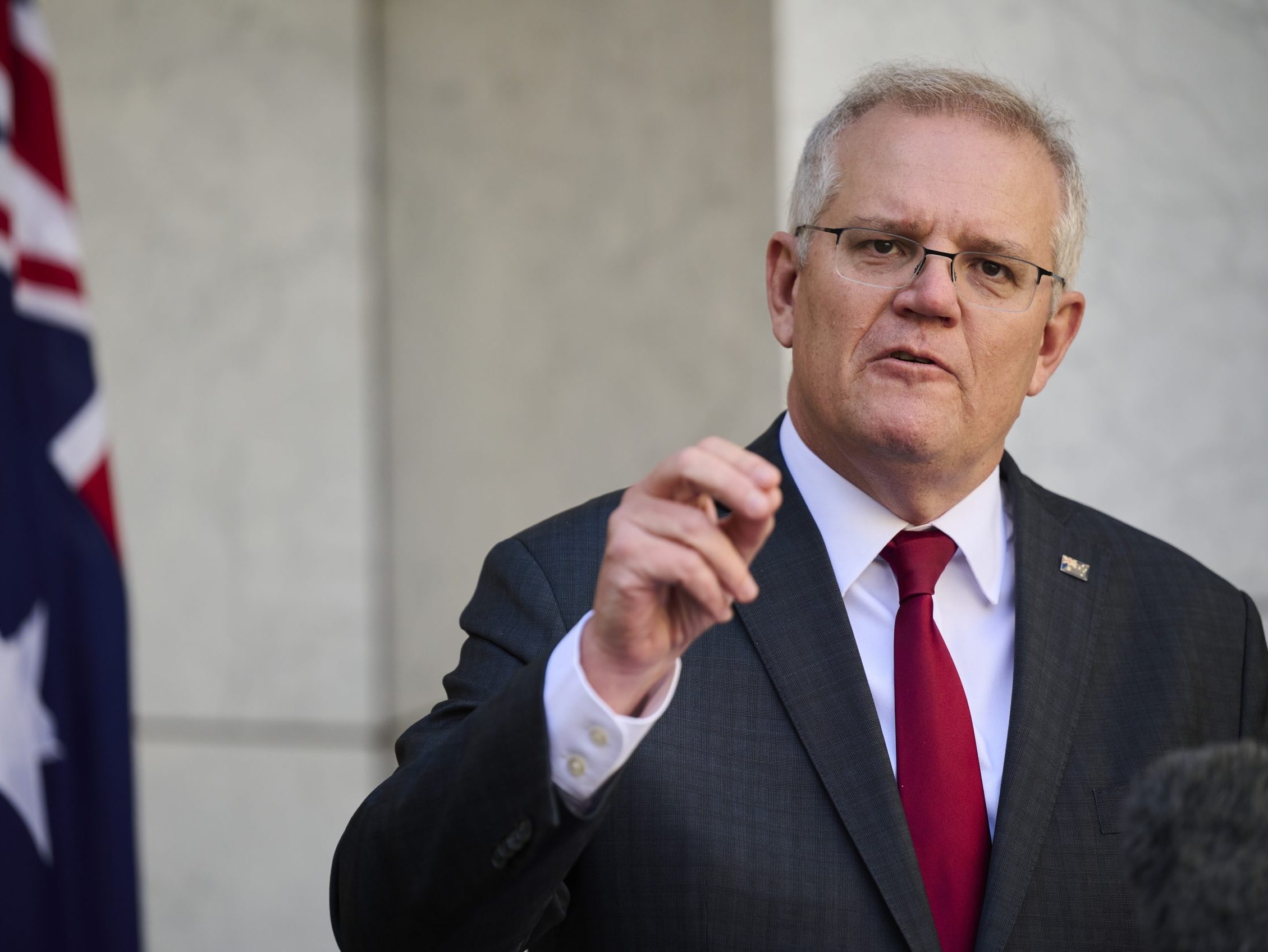 Australian pm morrison defends lockdown strategy as daily cases hit 