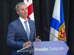 Progressive Conservative Premier-designate Tim Houston fields questions at a media availability after winning a majority government in the provincial election in New Glasgow, N.S. on Wednesday, Aug. 18, 2021.