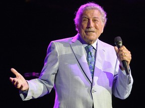 In this file photo taken on August 8, 2019 Tony Bennett performs on stage during an invitation only concert at the newly opened Encore Boston Harbor Casino in Everett, Massachusetts.