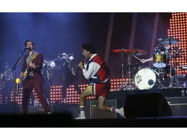 The Arkells with frontman Max Kerman and guitarist Mike DeAngelis  (L), played the Budweiser Stage as live music returned to Toronto with a full house of 10,500 in attendance and in support of their new album Blink Once .  Toronto, Ont. on Friday August 13, 2021. Jack Boland/Toronto Sun/Postmedia Network