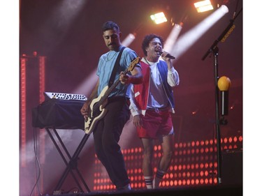 The Arkells, with frontman Max Kerman and bassist Nick Dika (L) , played the Budweiser Stage as live music returned to Toronto with a full house of 10,500 in attendance and in support of their new album Blink Once .  Toronto, Ont. on Friday August 13, 2021. Jack Boland/Toronto Sun/Postmedia Network