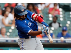 Aug 29, 2021; Detroit, Michigan, USA;  Toronto Blue Jays designated hitter Vladimir Guerrero Jr. (27) hits a single 5 against the Detroit Tigers at Comerica Park. Mandatory Credit: Rick Osentoski-USA TODAY Sports