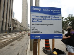 The City of Toronto, along with the TTC, doing streetcar track and watermain replacement as well as BIA streetscape improvements on Queen St. W., from Bay St. to Fennings St. (just before Dovercourt Rd.), between July and December of this year in eight phases (Pictured) TTC track and waterman replacement in front of City Hall on Wednesday, Aug. 11, 2021.