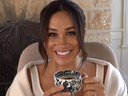 Screenshot of Meghan Markle holding a cup of tea from Archewell 40x40 video.