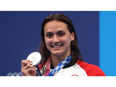 Tokyo 2020 Olympics - Swimming - Women's 100m Backstroke - Medal Ceremony - Tokyo Aquatics Centre - Tokyo, Japan - July 27, 2021. Kylie Masse of Canada poses with the silver medal REUTERS/Kai Pfaffenbach