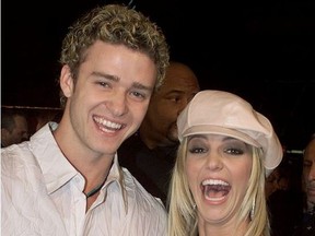 Singer and actress Britney Spears and boyfriend Justin Timberlake of NSYNC arrive for the premiere of Spears' new movie "Crossroads" in Hollywood, California, U.S. February 11, 2002.