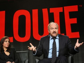 Cast members Pamela Adlon (L) and Louis C.K. participate in the "Louie" panel at the Television Critics Association (TCA) Winter Press Tour in Pasadena, California January 18, 2015.