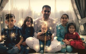 Ahmad Ferdaws Rahimi with his five children in happier times in Kabul, Afghanistan