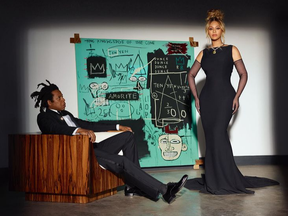 Jay-Z and Beyonce with Jean-Michel Basquiat painting "Equals Pi" for the Tiffany and Co. ad campaign About Love.