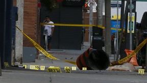 Toronto Police investigate a shooting that left one man dead and two women with non life-threatening injures on Saturday, Aug. 28, 2021.