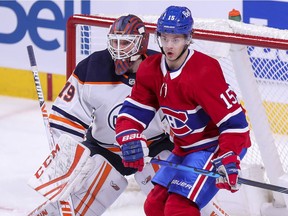 Montreal Canadiens' Jesperi Kotkaniemi sets up in front of Edmonton Oilers goalie Mikko Loskinen during second period in Montreal on May 10, 2021.