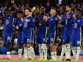 Chelsea's players react during the penalty shootout of their English League Cup third round match against Aston Villa at Stamford Bridge in London on Sept. 22, 2021. Chelsea advanced on penalties.