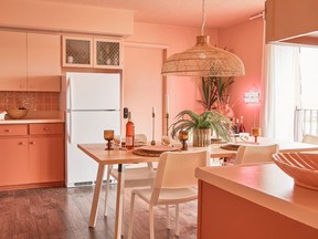 Blush tones like Apricot Beige by Benjamin Moore, faux plants and vintage pieces featured in the residence kitchen set the tone for the makeover. LAUREN MILLER