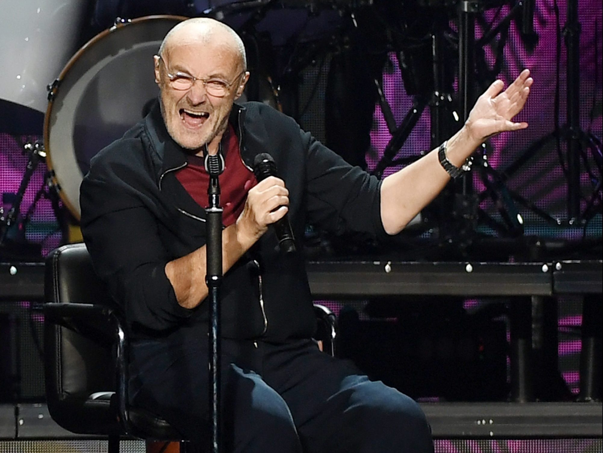 Phil Collins kicks off Genesis farewell tour sitting down