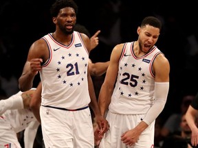 Joel Embiid and Ben Simmons of the Philadelphia 76ers celebrate the win over the Brooklyn Nets at Barclays Center on April 20, 2019 in the Brooklyn borough of New York City.