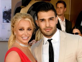 Britney Spears and Sam Asghari arrive at Sony Pictures' premiere "One Upon A Time...In Hollywood" at the Chinese Theater on July 22, 2019 in Hollywood, California.