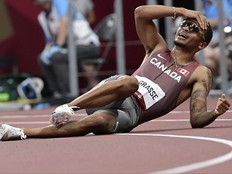 Canada's Andre De Grasse celebrates after winning the men's 200m final during the Tokyo 2020 Olympic Games.