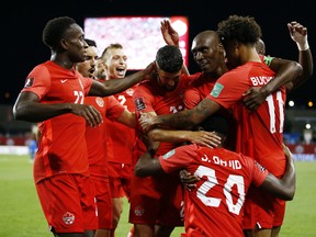 Canada celebrates after scoring a goal during a 2022 World Cup Qualifying match against El Salvador at BMO Field on September 8, 2021.