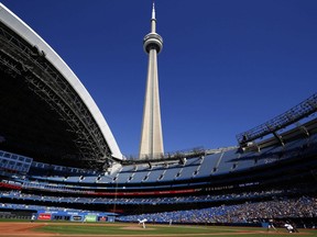 Jose Berrios of the Blue Jays delivers a pitch to Jorge Polanco of the Twins in the fourth inning during a game at Rogers Centre in Toronto, Sept. 19, 2021.