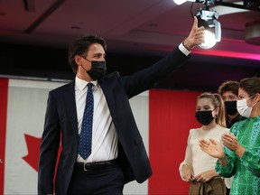 Canada's Prime Minister and Liberal Party Leader Justin Trudeau and his wife Sophie Gregoire Trudeau arrive for his victory speech at election headquarters on September 20, 2021 in Montreal, Canada.
