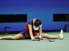 Bianca Andreescu of Canada is seen on the ground as she plays against Maria Sakkari of Greece during her Women’s Singles round of 16 match on Day Eight of the 2021 US Open at USTA Billie Jean King National Tennis Center on September 6, 2021 in the Flushing neighborhood of the Queens borough of New York City.