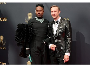 Billy Porter, left, and Adam Smith attend the 73rd Primetime Emmy Awards in Los Angeles, Sept. 19, 2021.