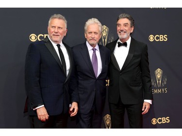 Left to right: Paul Reiser, Michael Douglas, and Chuck Lorre attend the 73rd Primetime Emmy Awards in Los Angeles, Sept. 19, 2021.