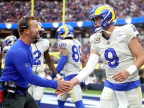 QB Matt Stafford,being congratulated by head coach Sean McVay after a third- quarter touchdown  against the Tampa Bay Buccaneers on September 26, 2021, is one reason why the L.A. Rams top our first Power Rankings.