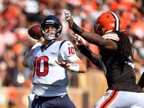 Quarterback Davis Mills of the Houston Texans throws the ball.