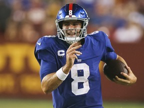 LANDOVER, MARYLAND - SEPTEMBER 16: Daniel Jones #8 of the New York Giants rushes for a long gain during the second quarter against the Washington Football Team at FedExField on September 16, 2021 in Landover, Maryland. (Photo by Rob Carr/Getty Images)