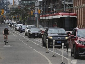 A section of Dundas Ave. E. was full of cars and TTC vehicles on Sunday, Sept. 12, 2021.