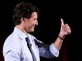 Liberal Leader Justin Trudeau gives a thumb-up at the Metro Toronto Convention Centre during his election campaign tour on Sept. 1, 2021.