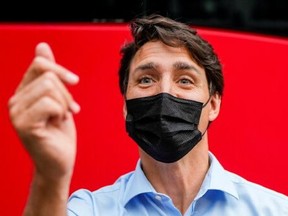 Liberal Leader Justin Trudeau greets supporters during his election campaign tour in Saint Bruno-de-Montarville on Sept. 11, 2021.