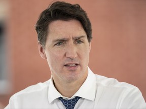 Prime Minister Justin Trudeau responds to questions following an announcement at the Shepherds of Good Hope residence in Ottawa, Wednesday, June 30, 2021. THE CANADIAN PRESS/Adrian Wyld