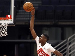 Raptors forward Chris Boucher throws down dunks against the Pistons last season. Boucher could see more minutes early in the season with Pascal Siakam out.