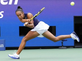 Leylah Fernandez  hits a backhand against Emma Raducanu in the women's singles final of the 2021 U.S. Open tennis tournament in New York.