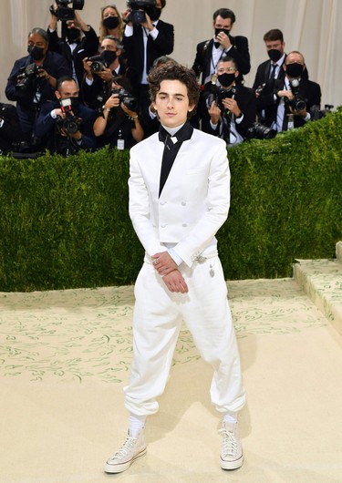 U.S.-French actor Timothee Chalamet arrives for the 2021 Met Gala at the Metropolitan Museum of Art on September 13, 2021 in New York.  (Photo by ANGELA  WEISS/AFP via Getty Images)