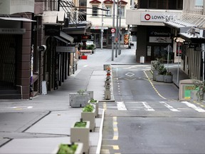 The normally bustling High Street in Auckland’s CBD is largely deserted during a lockdown to curb the spread of a COVID-19 outbreak, in Auckland, New Zealand, Aug. 26, 2021.